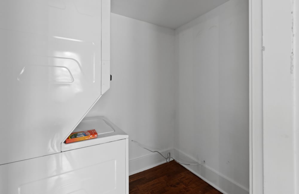 A stacked washer and dryer in the laundry room at The Avalon in Memphis, Tennessee 