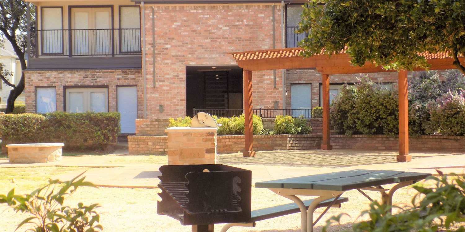 Poolside cabana and sundeck at Branch Creek Apartments in Carrollton, Texas