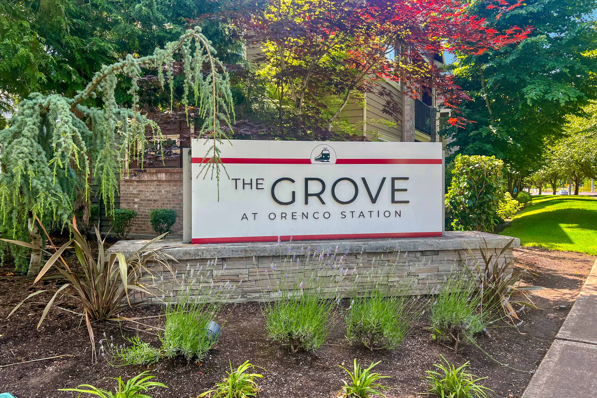 Monument sign outside of The Grove at Orenco Station in Hillsboro, Oregon