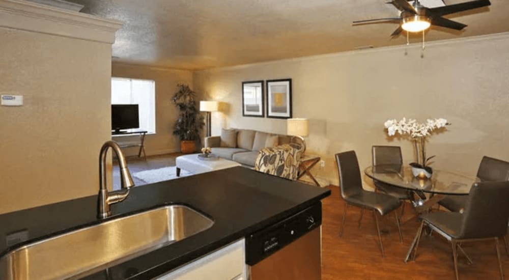 Kitchen and dining room at Quailwood Apartments in Stockton, California