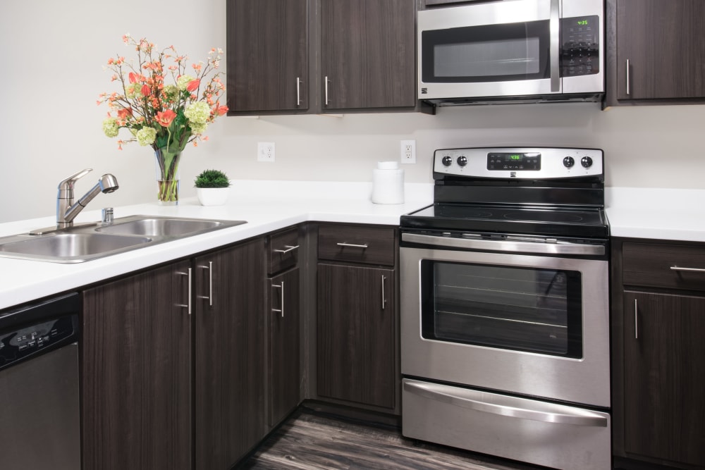 A kitchen with plenty of cabinet space at Brookside Village in Auburn, Washington