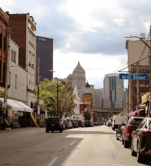 Street view with sunset at The Maxx and The Alexandra in Pittsburgh, Pennsylvania