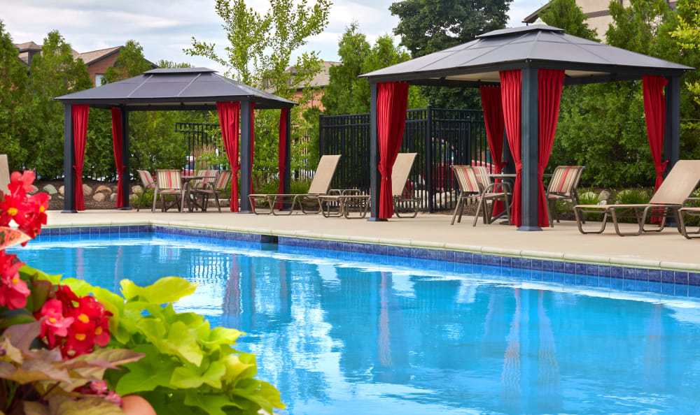 Gorgeous pool area at The Trilogy Apartments in Belleville