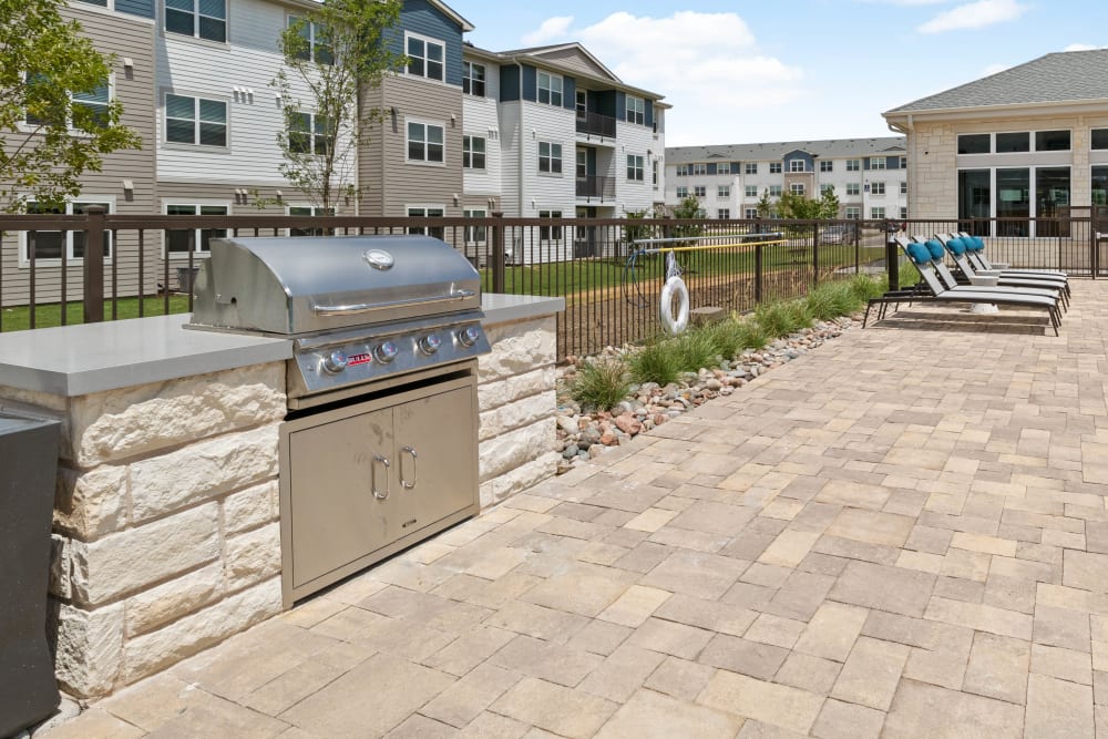 Barbecue station at Linden Ranch's clubhouse in Sachse, Texas