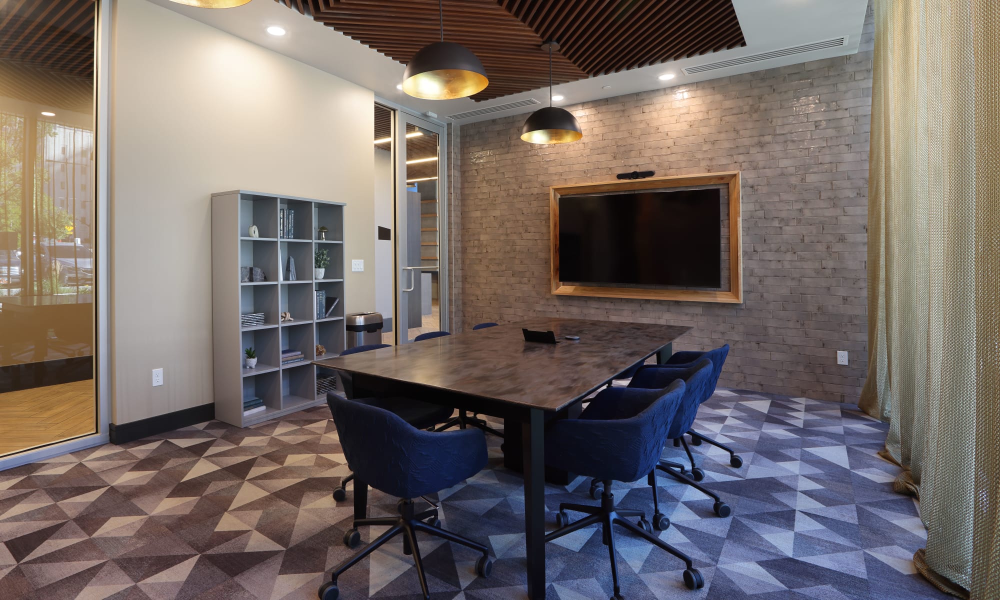 Work conference room with table and tv at Luxury high-rise community of Liberty SKY in Salt Lake City, Utah