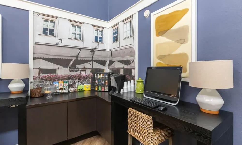 A coffee station and computer for residents in the clubhouse at The Granite at Porpoise Bay in Daytona Beach, Florida