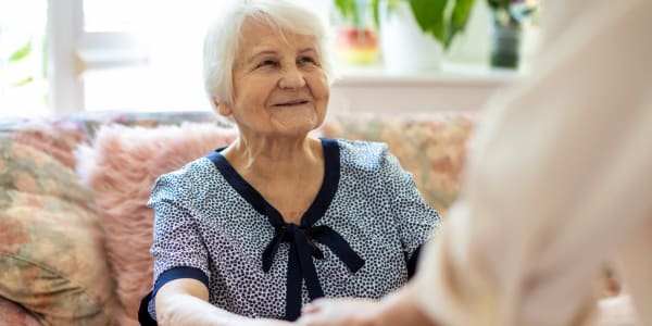 Residents holding hands at Ingleside Communities in Mount Horeb, Wisconsin