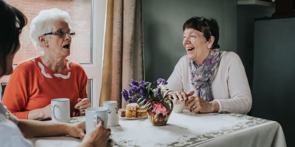 group of residents socializing over a meal at Maple Ridge Care Center in Spooner, Wisconsin