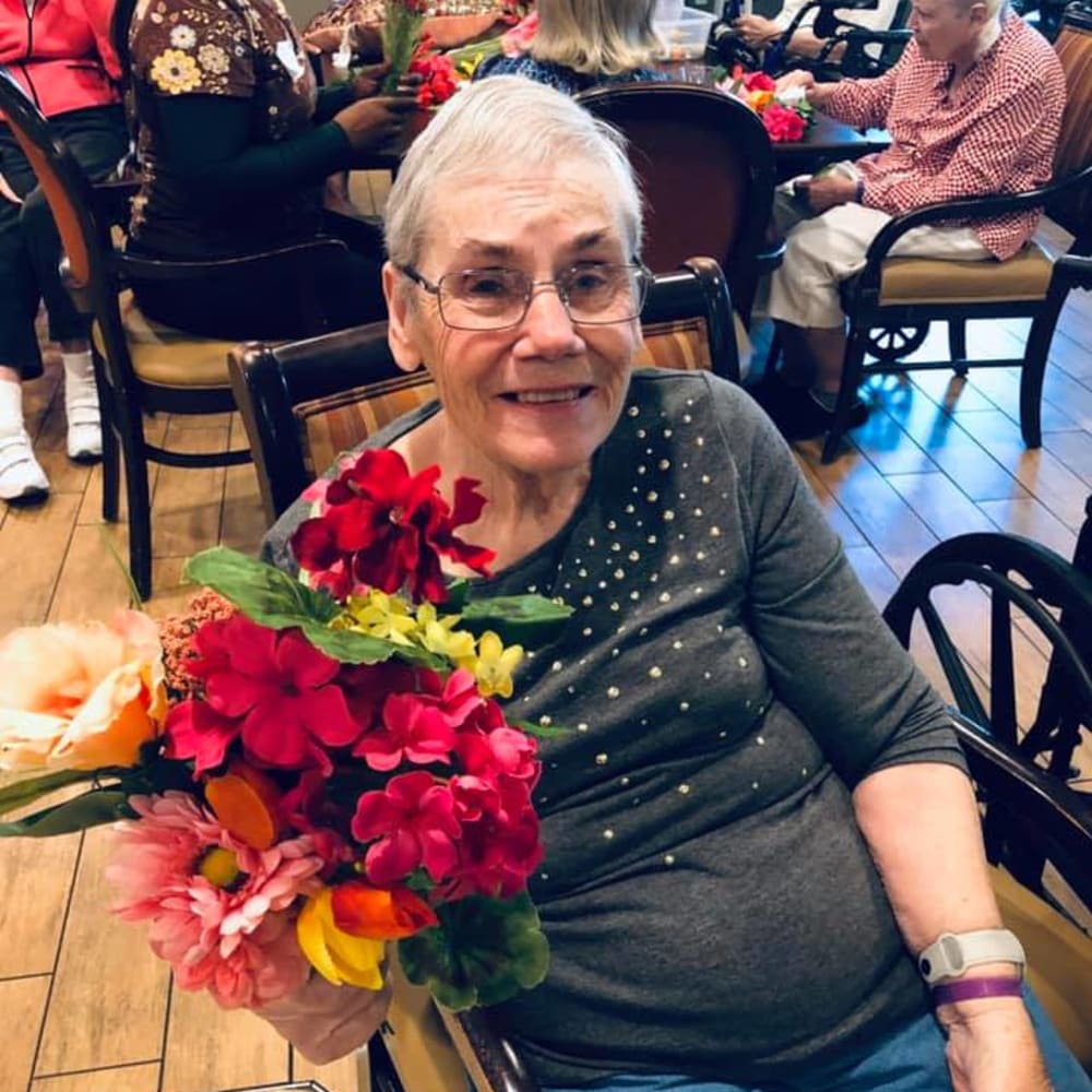 A resident received flowers at Inspired Living Tampa in Tampa, Florida