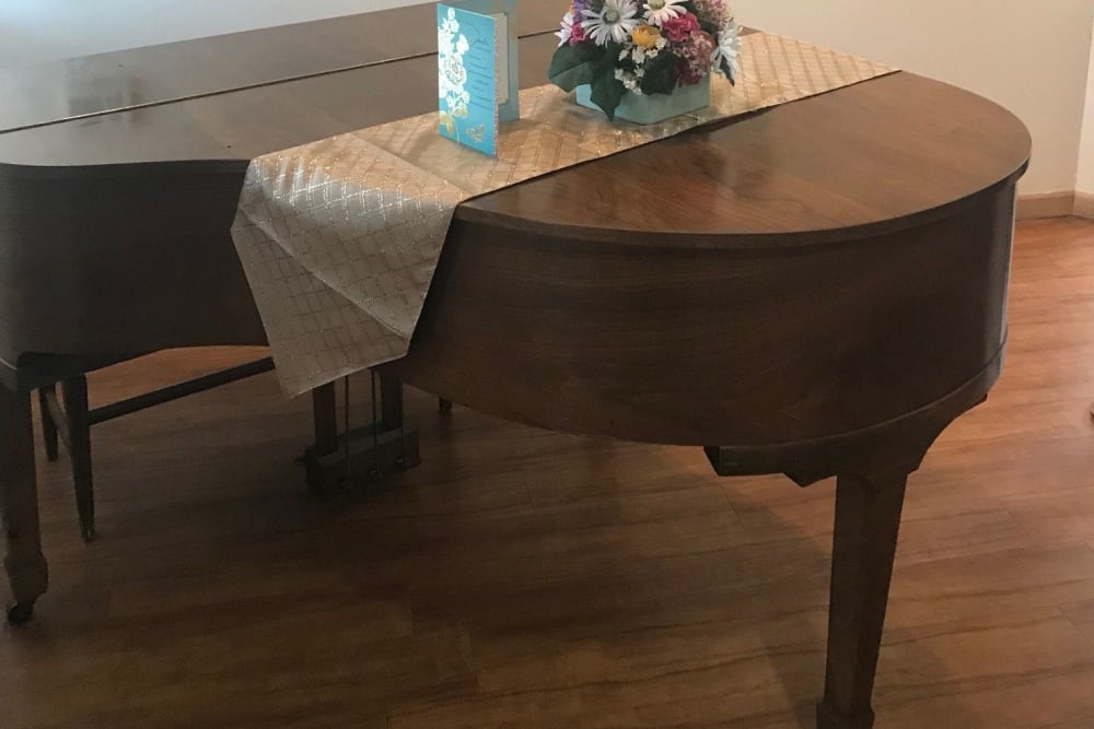 Baby grand piano in community music room at Ramsey Woods in Cudahy, Wisconsin.