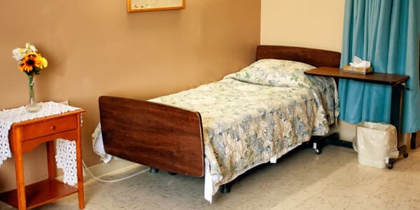 Transitional bedroom at East Troy Manor in East Troy, Wisconsin