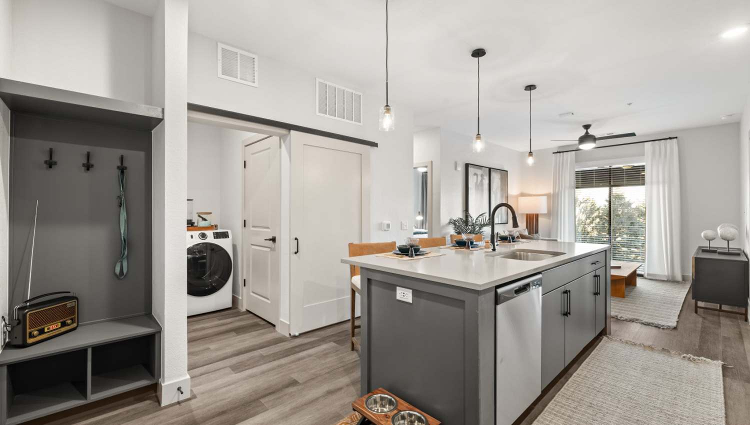 Kitchen with close access to living room at The Lock at Flatirons in Broomfield, Colorado