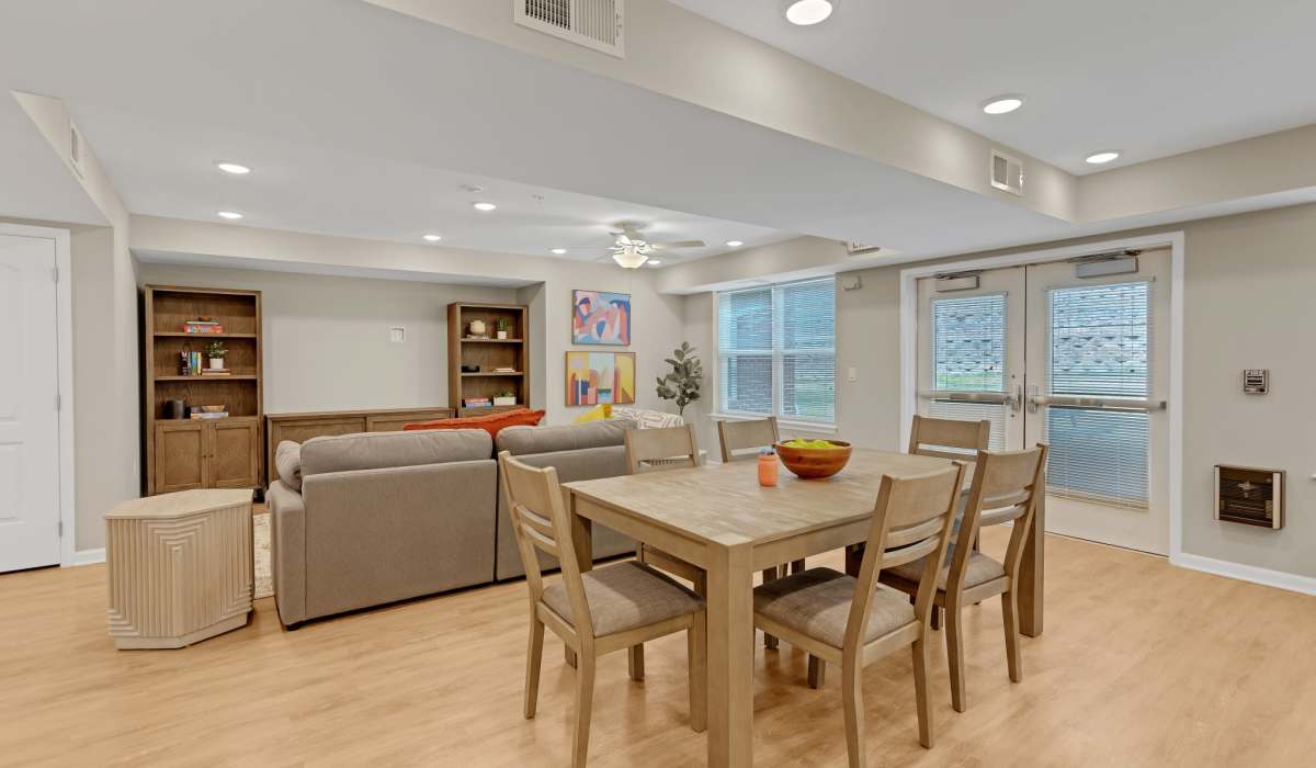 Clubhouse with table and seating area at Robinson Overlook in Columbia, Maryland