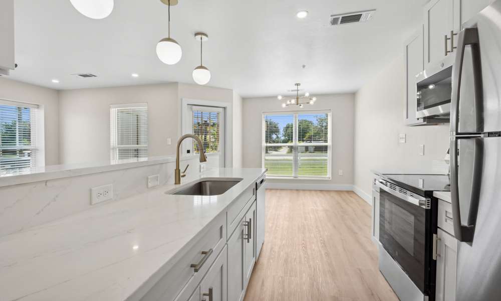 Kitchen with granite countertops at Lake Meadows in Garland, Texas