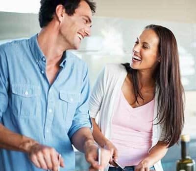 Couple making dinner at 933 the U in Rochester, NY