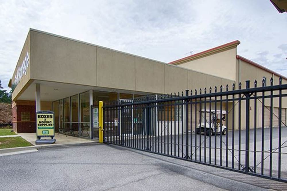 Exterior of office and gate entrance of Metro Self Storage in Lawrenceville, Georgia