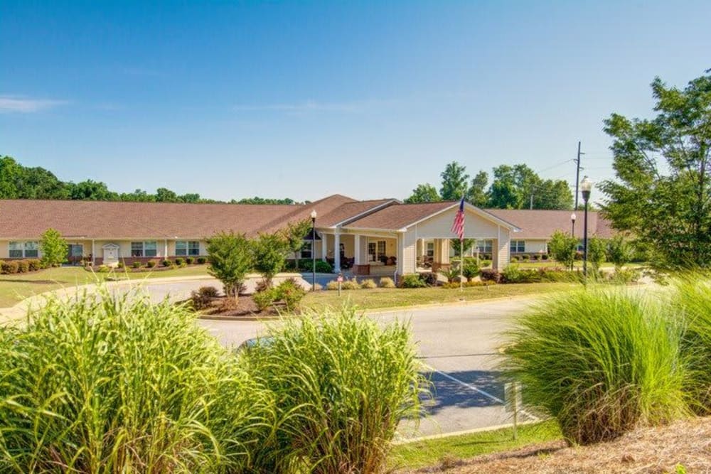 Exterior and greenery surrounding Carolina Gardens at Lexington in Lexington, South Carolina