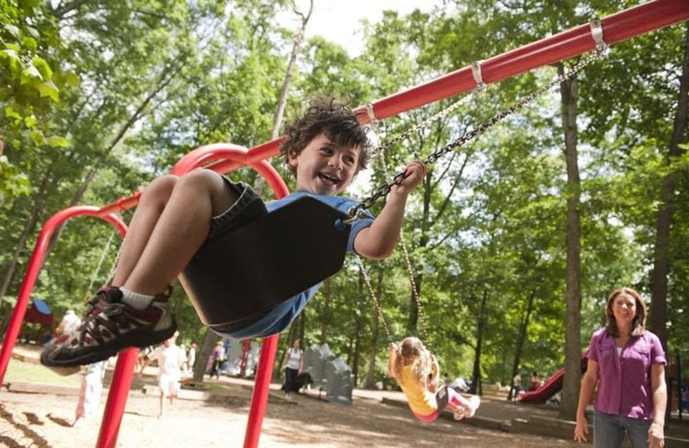 Children swinging at Forest Park in Chico, California