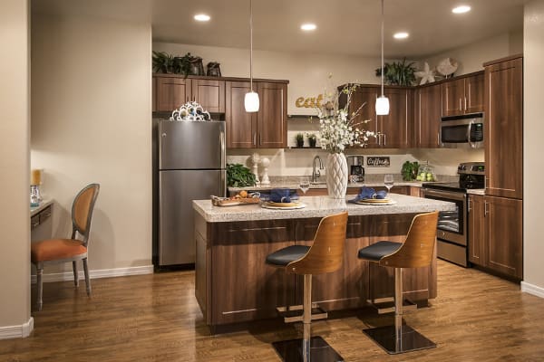 Kitchen with custom cabinetry at San Valencia in Chandler, Arizona