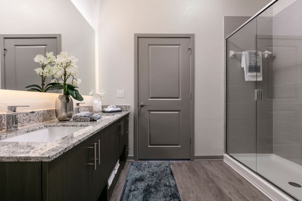 Bathroom with shower area at Integra Crossings in Sanford, Florida