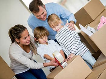 Family packing up their belongings to store at Metro Self Storage in Wood-Ridge, New Jersey