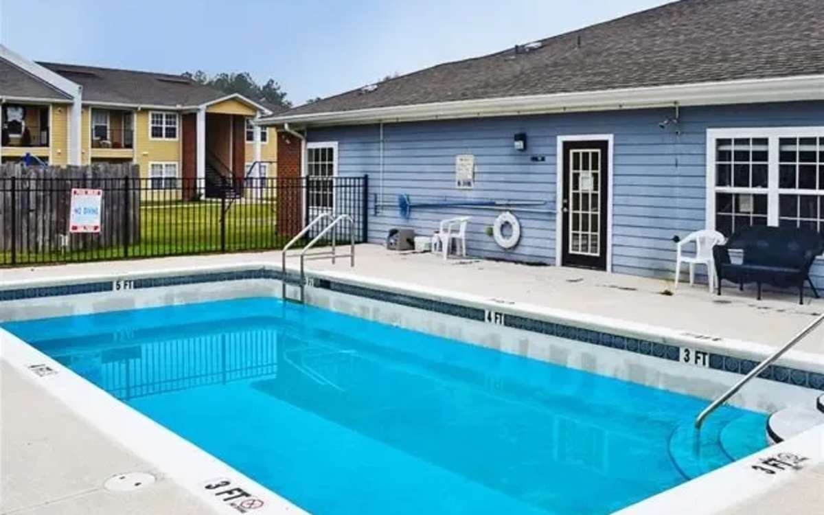 Swimming pool at Ochlockonee Pointe Apartments in Midway, Florida