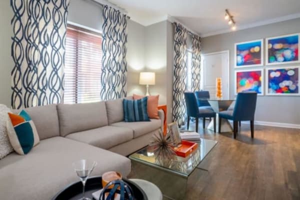 A comfortable, furnished apartment living room and dining room at Residences at Congressional Village in Rockville, Maryland