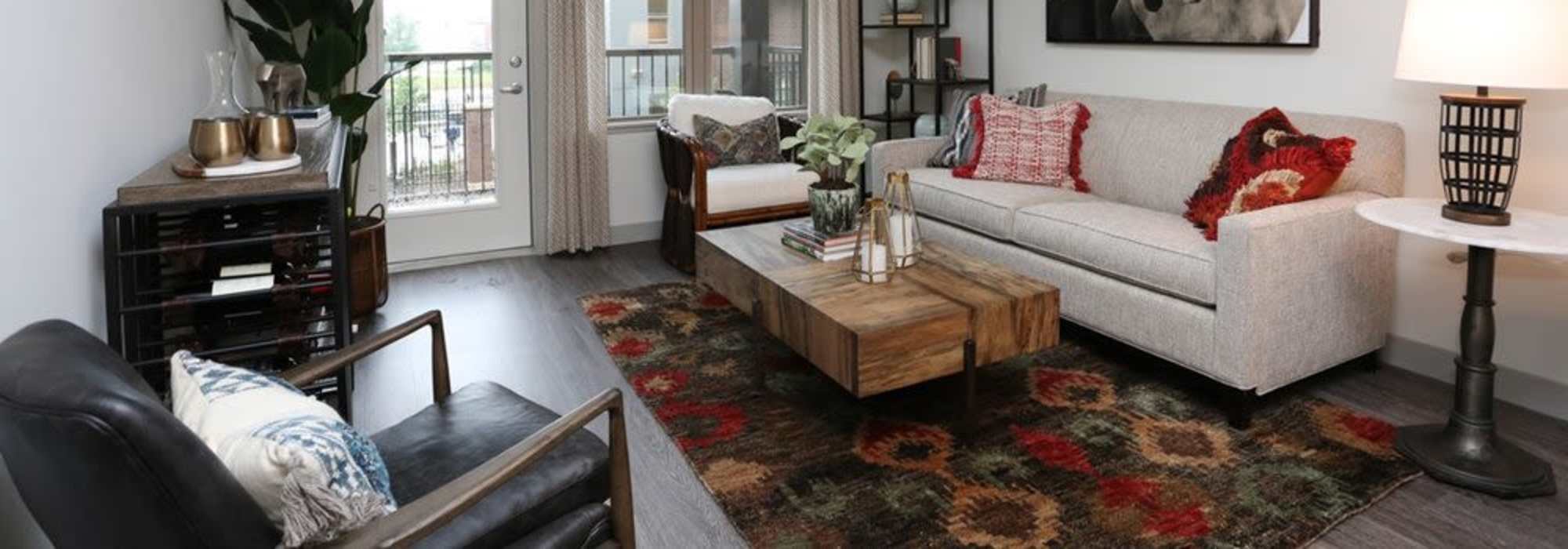 Living room with carpet at The Marling in Madison, Wisconsin