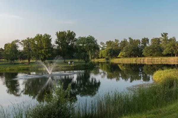 Pond at Creek Hill Apartments in Webster, New York