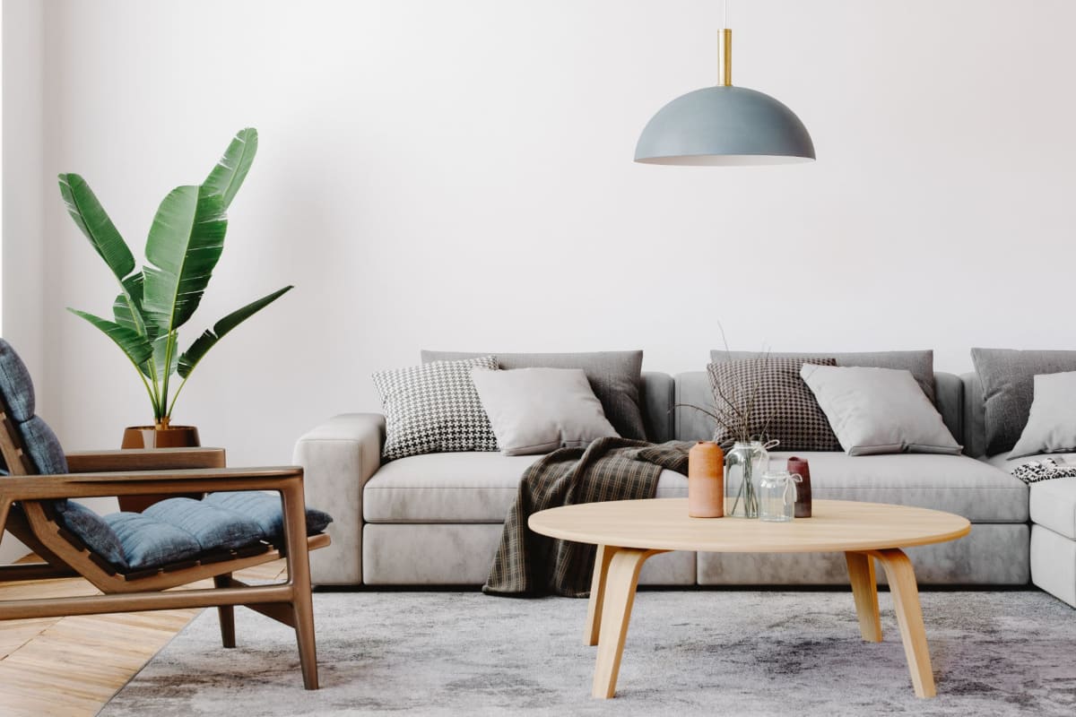 Apartment with sofa and chair at The Howard, Glendale, California