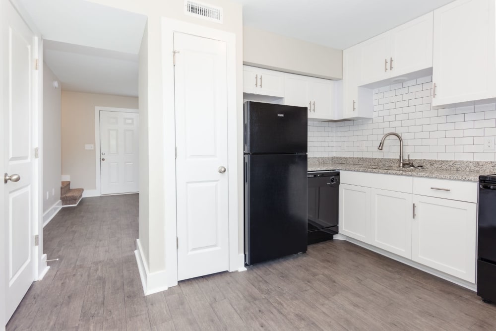 Kitchen with nice hardwood floors at The Hills at Oakwood Apartment Homes in Chattanooga, Tennessee