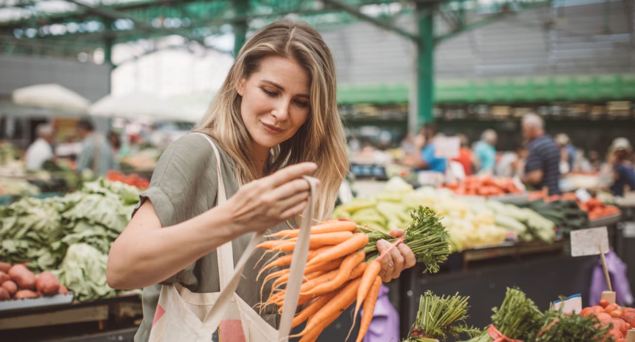 Resident shopping for produce in Allentown, Pennsylvania near Hampshire House