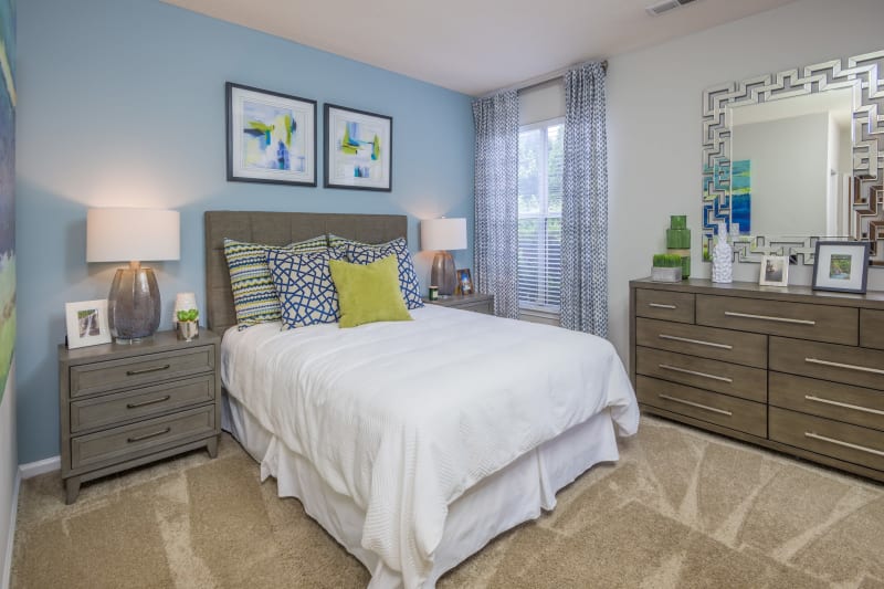 Bedroom with lots of space and a large window for lots of light at The Mark in Raleigh, North Carolina