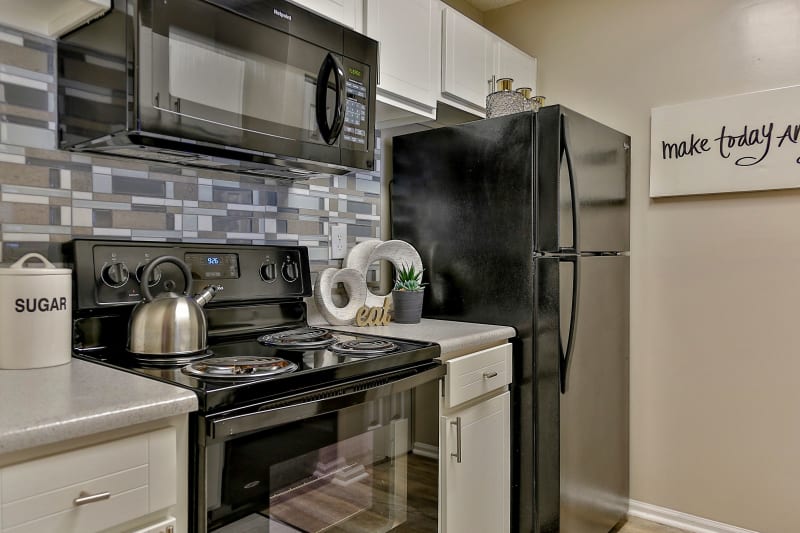 Kitchen with all black appliances at Lyric on Bell in Antioch, Tennessee