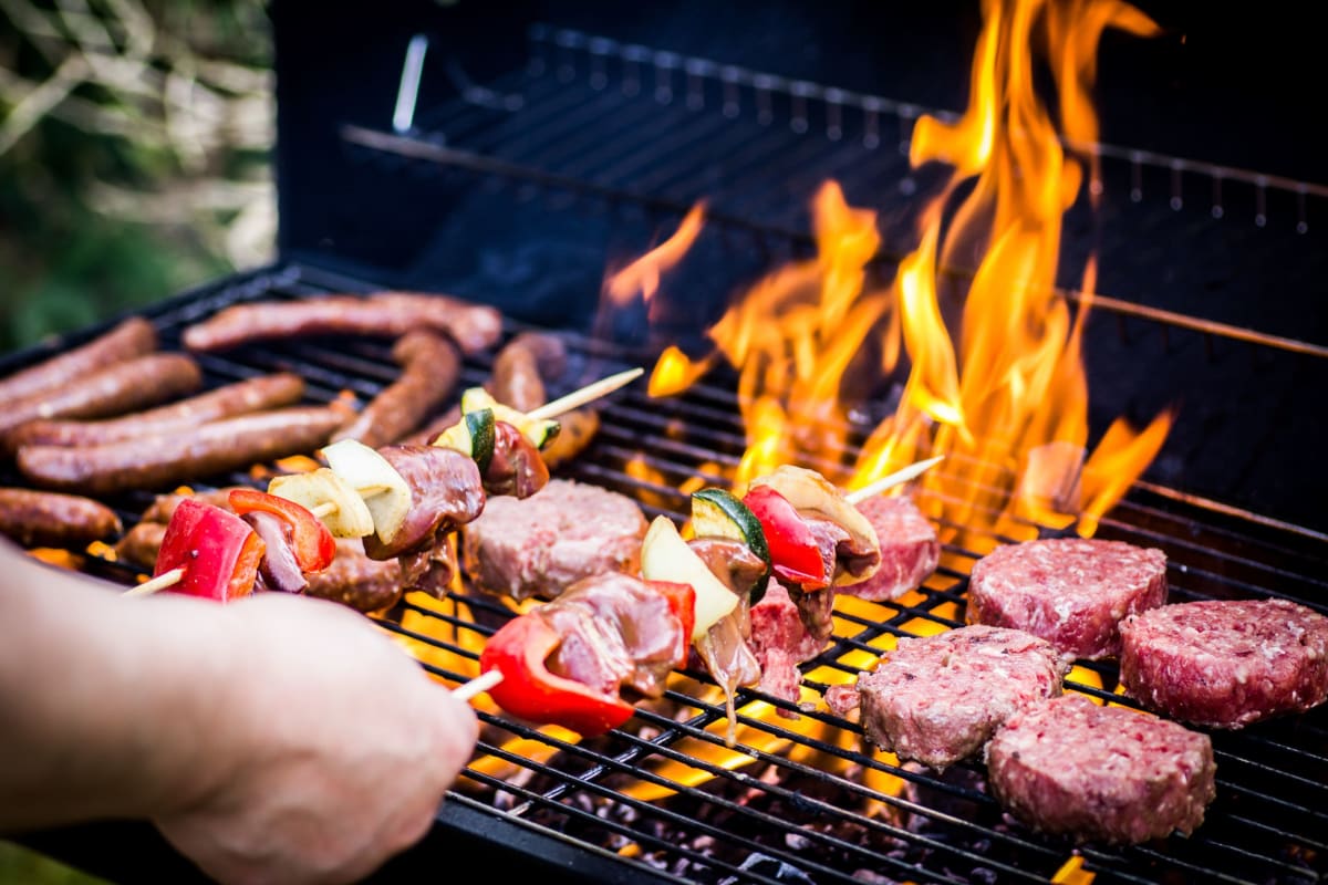 A resident barbeques at Kaitlin Court, Los Angeles, California
