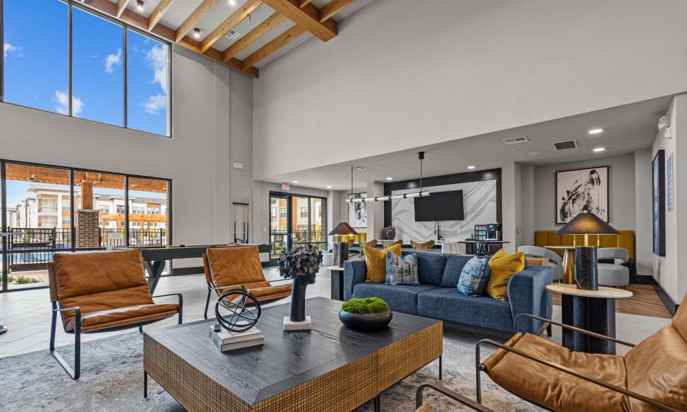 Clubhouse with couch at Opal Point at Kyle in Kyle. TX