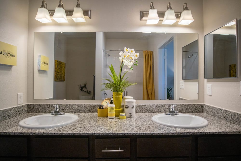 Granite counters in an apartment bathroom at Esperanza in San Antonio, Texas