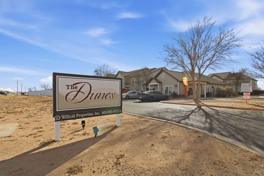 Property signage at Dunes Apartments in Seminole, Texas