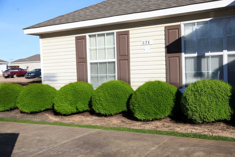 Exterior of an apartment with lawn space at Arrington Estates of Clarksdale in Clarksdale, Mississippi