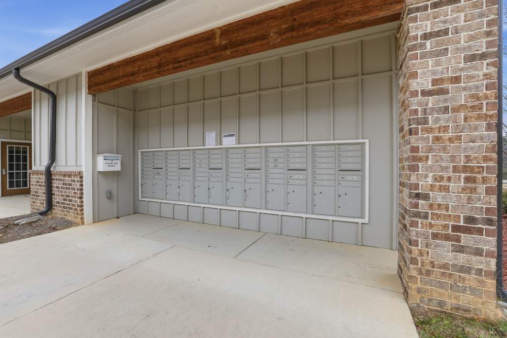 Charming entryway with secure mailboxes at Flats At Sam Lane in Ringgold, Georgia.
