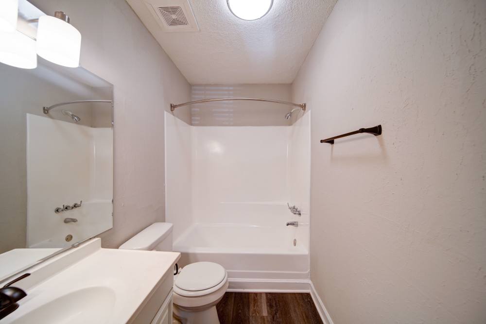 Modern washroom with attached bath tub near The Manor Townhomes in Winston-Salem, North Carolina