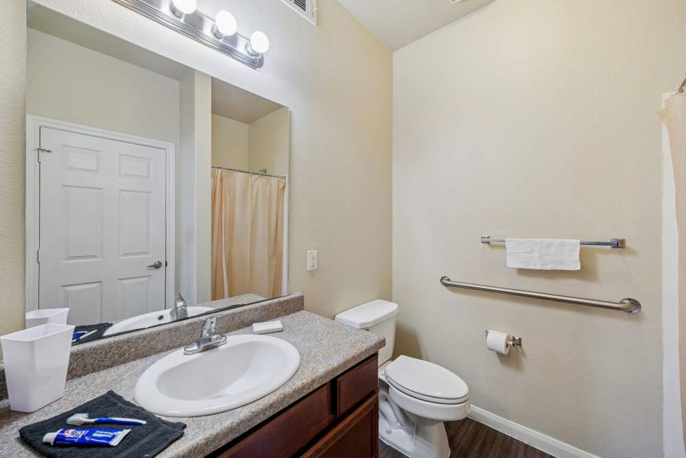 Charming bathroom with modern fixtures and elegant finishes at Arbor Pines in Orange, Texas.