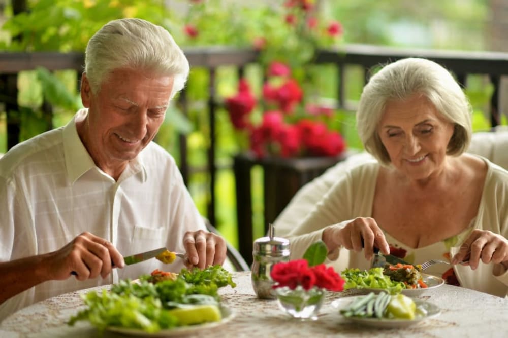 Two residents dining at The Iris Senior Living in Great Falls, Montana. 