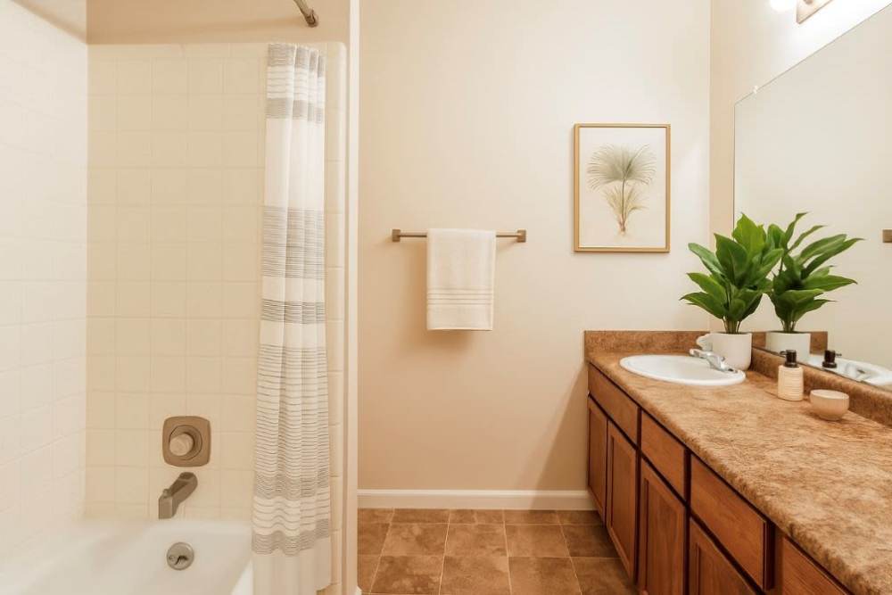 Bathroom with bathtub at Crown Villa Apartments in Savannah, Georgia