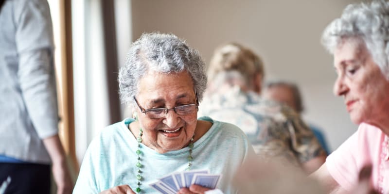 Residents playing cards at The Blake at Biloxi in Biloxi, Mississippi