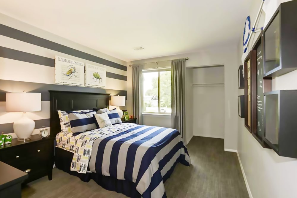 Spacious bedroom with closet at Satyr Hill Apartments in Parkville, Maryland