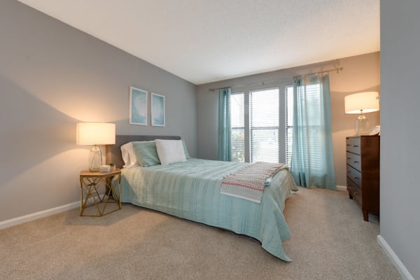 Spacious bedroom with plush carpeting at Andover Woods in Charlotte, North Carolina