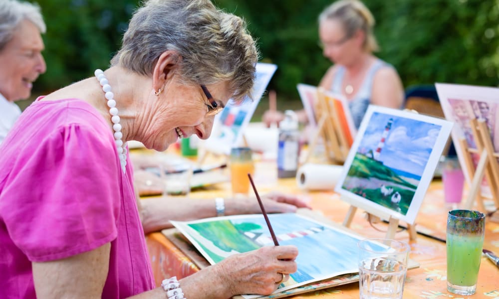 A resident painting at Amaran Senior Living in Albuquerque, New Mexico.