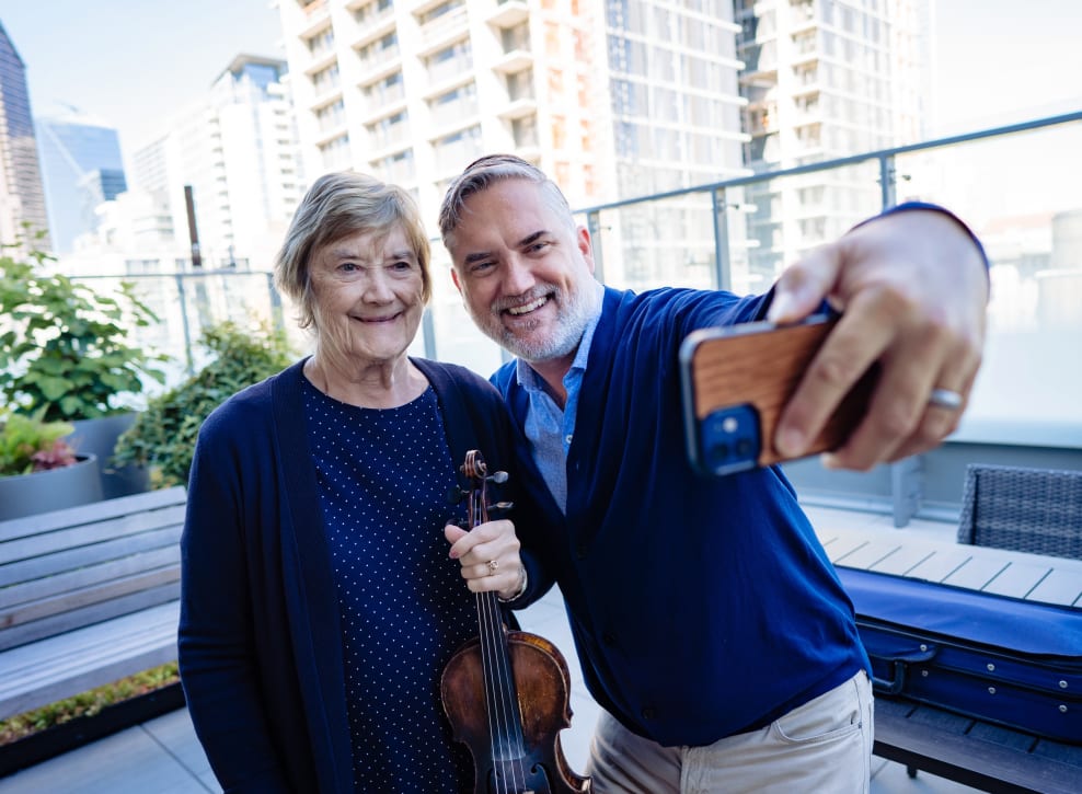 Residents taking a picture outside at Murano in Seattle, Washington