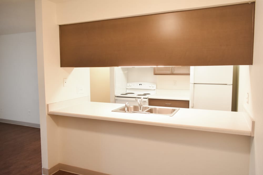 Fully equipped kitchen of a model apartment at Clairewood Apartments in Saint Clair, Michigan